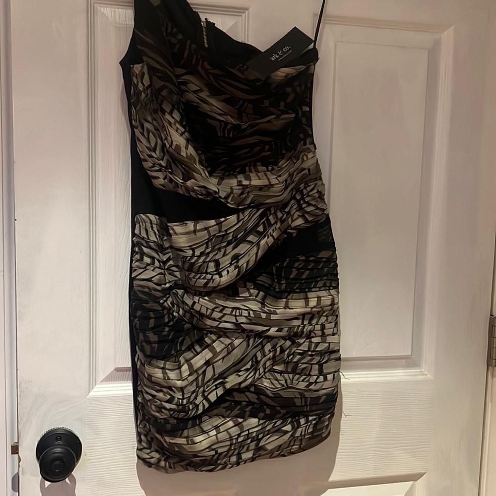 One shoulder out mini dress.